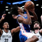 
              Brooklyn Nets forward RaiQuan Gray, center, attempts a layup during the first half of a preseason NBA basketball game against the Brooklyn Nets, Monday, Oct. 3, 2022, in New York. (AP Photo/Julia Nikhinson)
            