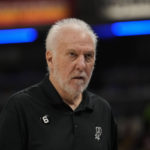 
              San Antonio Spurs head coach Gregg Popovich walks the sideline as his team plays against the Indiana Pacers during the first half of an NBA basketball game in Indianapolis, Friday, Oct. 21, 2022. (AP Photo/AJ Mast)
            