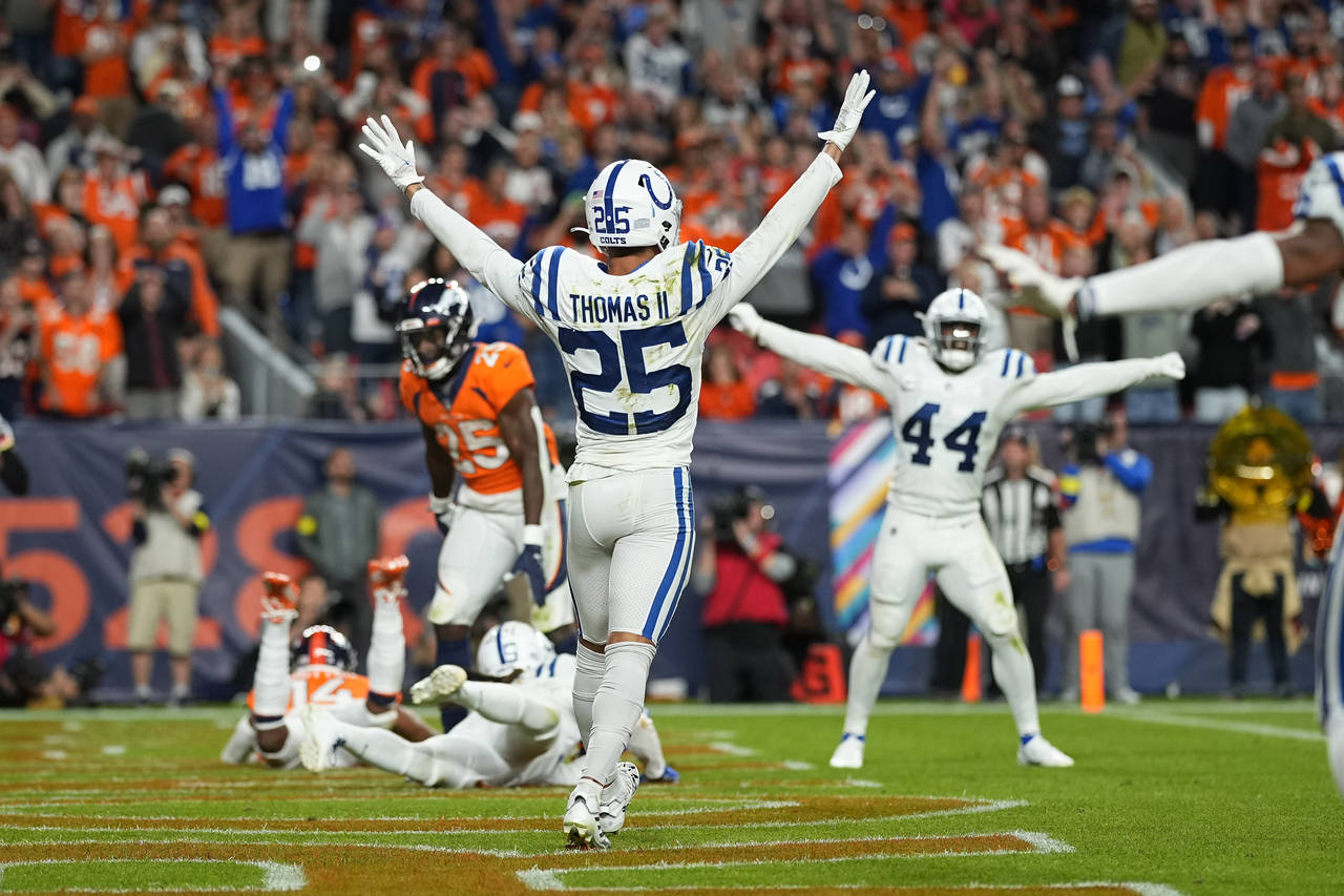 Indianapolis Colts safety Rodney Thomas II (25) and linebacker Zaire Franklin (44) celebrate after ...