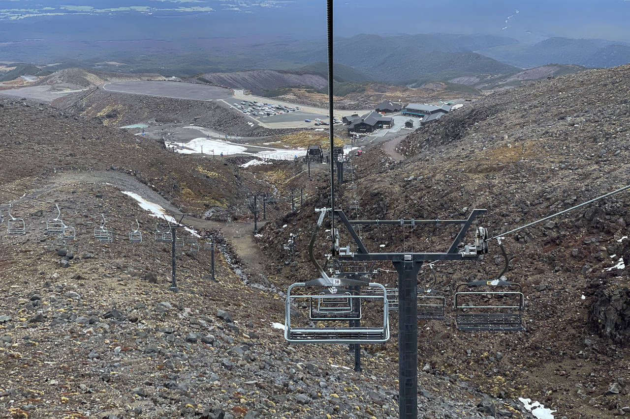 The ski slopes are almost devoid of snow at the Tūroa ski field, on Mt. Ruapehu, New Zealand on Se...