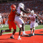 
              Texas defensive back Ryan Watts (6) intercepts a pass intended for Oklahoma State wide receiver Stephon Johnson Jr. (6) in the end zone during the second quarter of an NCAA college football game in Stillwater, Okla, Saturday, Oct. 22, 2022. (Ian Maule/Tulsa World via AP)
            