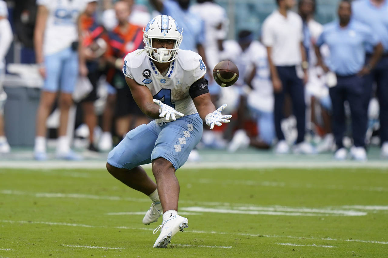 North Carolina running back Caleb Hood catches a pass during the first half of an NCAA college foot...