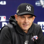 
              New York Yankees manager Aaron Boone attends a news conference before a workout ahead of Game 1 of baseball's American League Division Series against the Cleveland Guardians, Monday, Oct. 10, 2022, in New York. (AP Photo/John Minchillo)
            