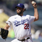 
              Los Angeles Dodgers starting pitcher Clayton Kershaw throws to a Colorado Rockies batter during the second inning of a baseball game, Wednesday, Oct. 5, 2022, in Los Angeles. (AP Photo/Marcio Jose Sanchez)
            