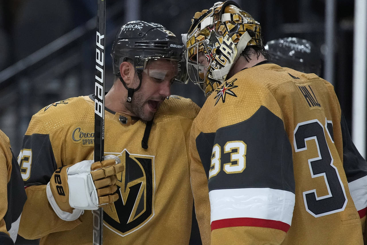 Vegas Golden Knights defenseman Alec Martinez, center, celebrates his goal  with center Jack Eichel, left, left wing William Carrier, second right, and  defenseman Alex Pietrangelo (7) during the second period in Game