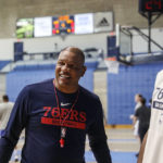 
              Philadelphia 76ers head coach Doc Rivers speaks with Danuel House after practice on the first day of Philadelphia 76ers NBA basketball training camp at the McAlister Field House on the campus of The Citadel in Charleston, S.C. on Tuesday, Sept. 27, 2022. (Heather Khalifa/The Philadelphia Inquirer via AP)
            