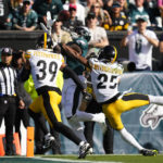 
              Philadelphia Eagles wide receiver A.J. Brown (11) catches a touchdown pass against Pittsburgh Steelers safety Minkah Fitzpatrick (39) and cornerback Ahkello Witherspoon (25) during the first half of an NFL football game between the Pittsburgh Steelers and Philadelphia Eagles, Sunday, Oct. 30, 2022, in Philadelphia. (AP Photo/Matt Slocum)
            