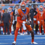 
              Boise State quarterback Taylen Green takes the snap against Colorado State during the first half of an NCAA college football game in Boise, Idaho, Saturday, Oct. 29, 2022. (AP Photo/Otto Kitsinger)
            