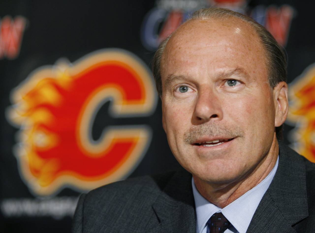 FILE - The Calgary Flames introduce Mike Keenan as the team's new head coach at a news conference i...