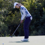 
              Xiyu Janet Lin, of China, putts on the eight green during the final round of the LPGA The Ascendant golf tournament in The Colony, Texas, Sunday, Oct. 2, 2022. (AP Photo/LM Otero)
            