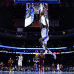 
              Philadelphia 76ers' James Harden goes up for a dunk during the first half of a preseason NBA basketball game against the Cleveland Cavaliers, Wednesday, Oct. 5, 2022, in Philadelphia. (AP Photo/Matt Slocum)
            