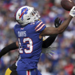 
              Buffalo Bills wide receiver Gabe Davis (13) catches a touchdown pass from quarterback Josh Allen with Pittsburgh Steelers safety Minkah Fitzpatrick, rear, defending during the first half of an NFL football game in Orchard Park, N.Y., Sunday, Oct. 9, 2022. (AP Photo/Joshua Bessex)
            