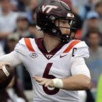 
              Virginia Tech quarterback Grant Wells (6) looks to pass against North Carolina during the first half of an NCAA college football game in Chapel Hill, N.C., Saturday, Oct. 1, 2022. (AP Photo/Chris Seward)
            