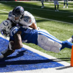 
              Indianapolis Colts tight end Mo Alie-Cox dives in for a touchdown under Tennessee Titans linebacker Dylan Cole in the first half of an NFL football game in Indianapolis, Fla., Sunday, Oct. 2, 2022. (AP Photo/Darron Cummings)
            