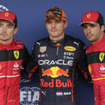 
              Red Bull driver Max Verstappen of the Netherlands, center, poses with Ferrari drivers Charles Leclerc, left, of Monaco and Carlos Sainz of Spain after the qualifying session of the Japanese Formula One Grand Prix at the Suzuka Circuit in Suzuka, central Japan, Saturday, Oct. 8, 2022. (AP Photo/Eugene Hoshiko)
            