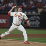 
              St. Louis Cardinals starting pitcher Miles Mikolas throws during the first inning in Game 2 of a National League wild-card baseball playoff series against the Philadelphia Phillies, Saturday, Oct. 8, 2022, in St. Louis. (AP Photo/Scott Kane)
            