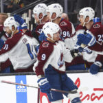 
              Colorado Avalanche center Evan Rodrigues (9) is congratulated for his goal against the Vegas Golden Knights during the second period of an NHL hockey game Saturday, Oct. 22, 2022, in Las Vegas. (AP Photo/Chase Stevens)
            