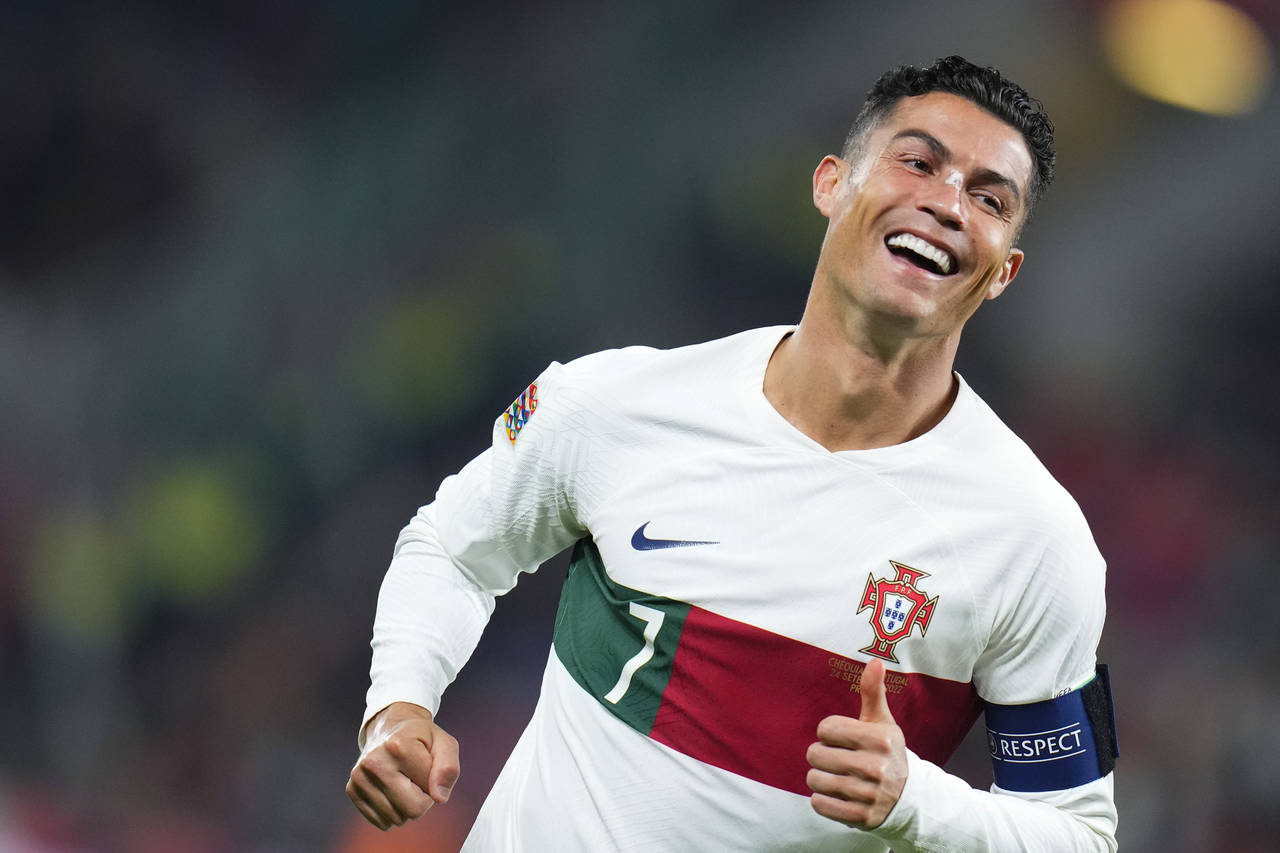 FILE - Portugal's Cristiano Ronaldo celebrates after Portugal's Diogo Dalot scored their side's thi...