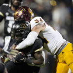 
              Arizona State linebacker Kyle Soelle, right, tackles Colorado running back Deion Smith after a short gain in the second half of an NCAA college football game Saturday, Oct. 29, 2022, in Boulder, Colo. (AP Photo/David Zalubowski)
            