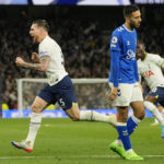 
              Tottenham's Pierre-Emile Hojbjerg, left, celebrates after scoring his side's second goal during the English Premier League soccer match between Tottenham Hotspur and Everton at the Tottenham Hotspur Stadium in London, England, Saturday, Oct. 15, 2022. (AP Photo/Kin Cheung)
            