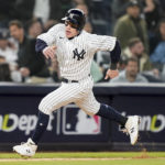 
              New York Yankees Harrison Bader rounds third base on his way to score against the New York Yankees during the fourth inning of Game 4 of an American League Championship baseball series against the Houston Astros, Sunday, Oct. 23, 2022, in New York. (AP Photo/John Minchillo)
            