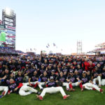 
              The Philadelphia Phillies pose for a photo after a win over the Atlanta Braves in Game 4 of baseball's National League Division Series, Saturday, Oct. 15, 2022, in Philadelphia. The Philadelphia Phillies won, 8-3.(AP Photo/Matt Rourke)
            