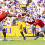 
              LSU quarterback Jayden Daniels runs the ball against Mississippi during an NCAA college football game at Tiger Stadium in Baton Rouge, La, Saturday, Oct. 22, 2022. (Scott Clause/The Daily Advertiser via AP)
            