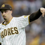 
              San Diego Padres starting pitcher Blake Snell reacts after striking out Los Angeles Dodgers' Will Smith during the first inning in Game 3 of a baseball NL Division Series, Friday, Oct. 14, 2022, in San Diego. (AP Photo/Ashley Landis)
            