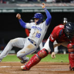 
              Kansas City Royals' Nate Eaton scores past Cleveland Guardians catcher Austin Hedges on a single by Nicky Lopez during the fifth inning of a baseball game, Tuesday, Oct. 4, 2022, in Cleveland. (AP Photo/Ron Schwane)
            
