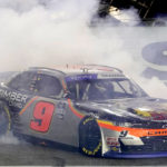 
              Noah Gragson (9) does a burnout after winning the NASCAR Xfinity Series auto race at Homestead-Miami Speedway, Saturday, Oct. 22, 2022, in Homestead, Fla. (AP Photo/Lynne Sladky)
            