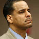 
              FILE - In this Feb. 23, 2010 file photo, Tears fall down the cheeks of Jayson Williams as he is sentenced to five years in prison, Tuesday Feb. 23, 201,0 at State Superior Court in Somerville, N.J. The teenage daughters of former NBA All-Star Jayson Williams have denounced St. John’s University for its decision to induct their father into the school’s Athletics Hall of Fame. Tryumph and Whizdom Williams both wrote open letters they sent Friday, Oct. 21, 2022, to The Associated Press, and also planned to send to St. John’s, that said the school should be ashamed for his induction into the class during Saturday’s homecoming weekend. (AP Photo/Matt Rainey, Pool, File)
            