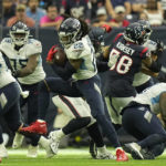 
              Tennessee Titans running back Derrick Henry (22) carries the ball against the Houston Texans during the first half of an NFL football game Sunday, Oct. 30, 2022, in Houston. (AP Photo/Eric Gay)
            