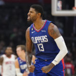 
              LA Clippers forward Paul George (13) reacts after making a 3-pointer during the second half of an NBA basketball game against the Houston Rockets in Los Angeles, Monday, Oct. 31, 2022. (AP Photo/Ashley Landis)
            