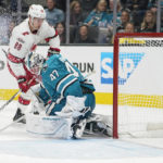 
              San Jose Sharks goaltender James Reimer (47) is unable to stop a shot by Carolina Hurricanes center Martin Necas (88) on a goal during the second period of an NHL hockey game in San Jose, Calif., Friday, Oct. 14, 2022. (AP Photo/Godofredo A. Vásquez)
            