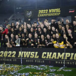 
              Portland Thorns FC pose with the trophy after they won the NWSL championship soccer match against the Kansas City Current, Saturday, Oct. 29, 2022, in Washington. Portland won 2-0. (AP Photo/Nick Wass)
            