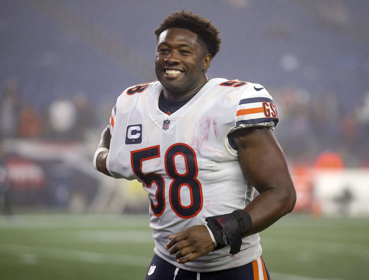 FILE - Chicago Bears linebacker Roquan Smith walks off the field following an NFL football game aga...