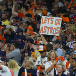 
              Fans watch play during the fifth inning in Game 2 of baseball's American League Championship Series between the Houston Astros and the New York Yankees, Thursday, Oct. 20, 2022, in Houston. (AP Photo/Kevin M. Cox)
            