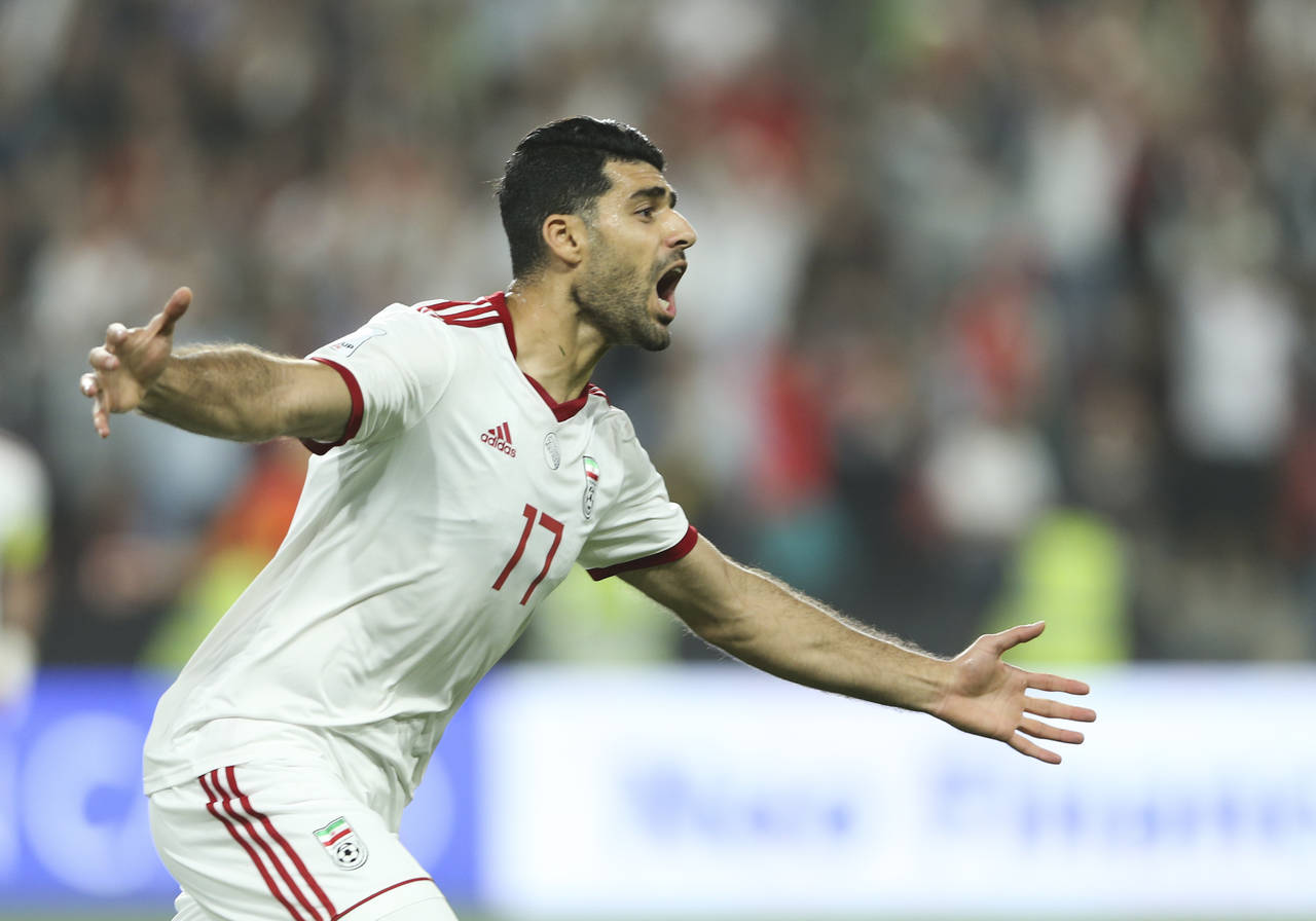 FILE - Iran forward Mehdi Taremi celebrates after he scored first goal during the AFC Asian Cup qua...