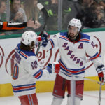 
              New York Rangers center Mika Zibanejad (93) celebrates his goal against the Dallas Stars with left wing Artemi Panarin (10) during the second period of an NHL hockey game in Dallas, Saturday, Oct. 29, 2022. (AP Photo/Michael Ainsworth)
            
