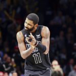 
              Brooklyn Nets guard Kyrie Irving (11) reacts after the team defeated the Indiana Pacers in an NBA basketball game Monday, Oct. 31, 2022, in New York. (AP Photo/Jessie Alcheh)
            