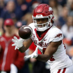 
              Arkansas wide receiver Bryce Stephens catches a pass during the first half of an NCAA college football game against Auburn, Saturday, Oct. 29, 2022, in Auburn, Ala. (AP Photo/Butch Dill)
            