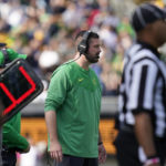 
              Oregon head coach Dan Lanning, center, watches the second half of an NCAA college football game against California in Berkeley, Calif., Saturday, Oct. 29, 2022. (AP Photo/Godofredo A. Vásquez)
            