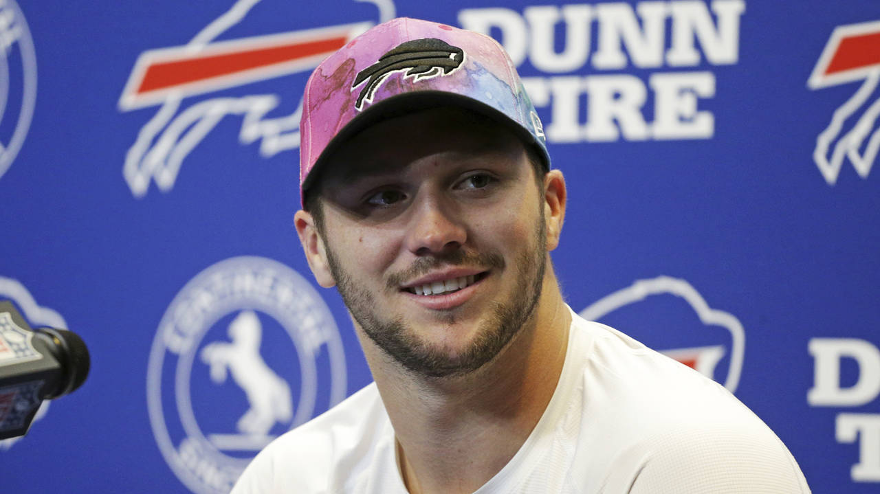 Buffalo Bills quarterback Josh Allen meets with reporters after an NFL football game iagainst the P...