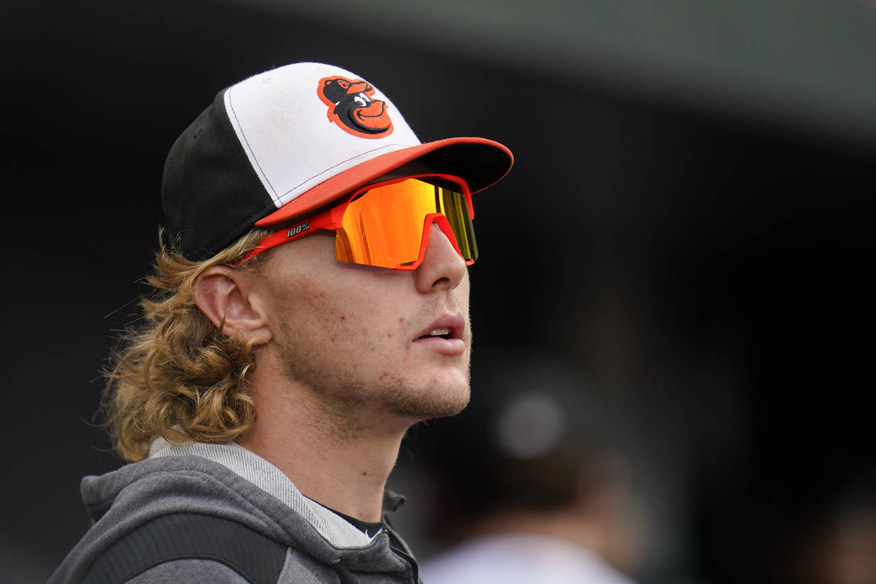 Baltimore Orioles' Gunnar Henderson looks on from the dugout during the fourth inning of the second...
