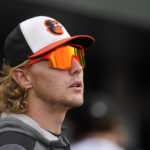 
              Baltimore Orioles' Gunnar Henderson looks on from the dugout during the fourth inning of the second game of a baseball doubleheader against the Toronto Blue Jays, Wednesday, Oct. 5, 2022, in Baltimore. AP Photo/Julio Cortez)
            