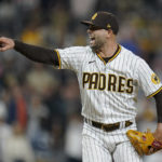 
              San Diego Padres relief pitcher Nick Martinez reacts after getting the last out in the ninth inning of a baseball game against the San Francisco Giants, Tuesday, Oct. 4, 2022, in San Diego. The Padres won, 6-2. (AP Photo/Gregory Bull)
            