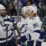 
              Tampa Bay Lightning defenseman Victor Hedman (77) celebrates with left wing Alex Killorn, center, who scored a goal, and center Steven Stamkos (91), right, against the San Jose Sharks in the second period of an NHL hockey game, Saturday, Oct. 29, 2022, in San Jose, Calif., Saturday, Oct. 29, 2022. (AP Photo/Josie Lepe)
            