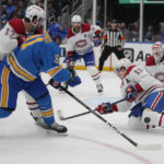 
              Montreal Canadiens' Brendan Gallagher (11) blocks a shot from St. Louis Blues' Vladimir Tarasenko (91) during the second period of an NHL hockey game Saturday, Oct. 29, 2022, in St. Louis. (AP Photo/Jeff Roberson)
            