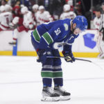 
              Vancouver Canucks' Bo Horvat pauses on the ice after the Carolina Hurricanes defeated Vancouver 3-2 during an NHL hockey game in Vancouver, British Columbia, on Monday, Oct. 24, 2022. (Darryl Dyck/The Canadian Press via AP)
            