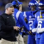 
              Kentucky head coach Mark Stoops calls out to an official during the first half of an NCAA college football game against Mississippi State in Lexington, Ky., Saturday, Oct. 15, 2022. (AP Photo/Michael Clubb)
            